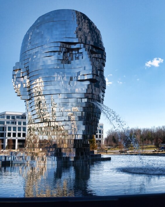 Charlotte: Metalmorphosis, the mirrored water fountain — Charlotte