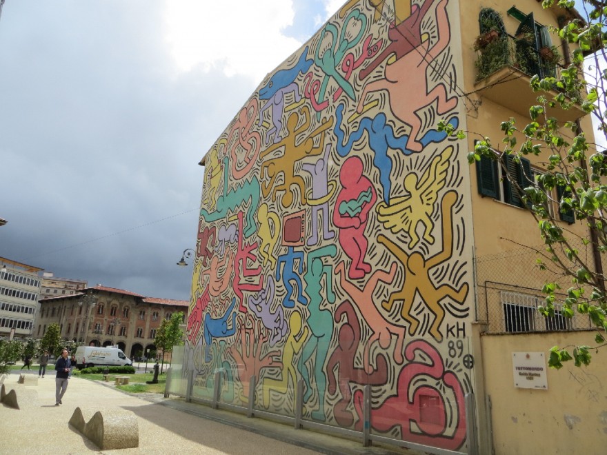 Tuttomondo a mural Keith haringa - Pisa | Secret World Trip Planner