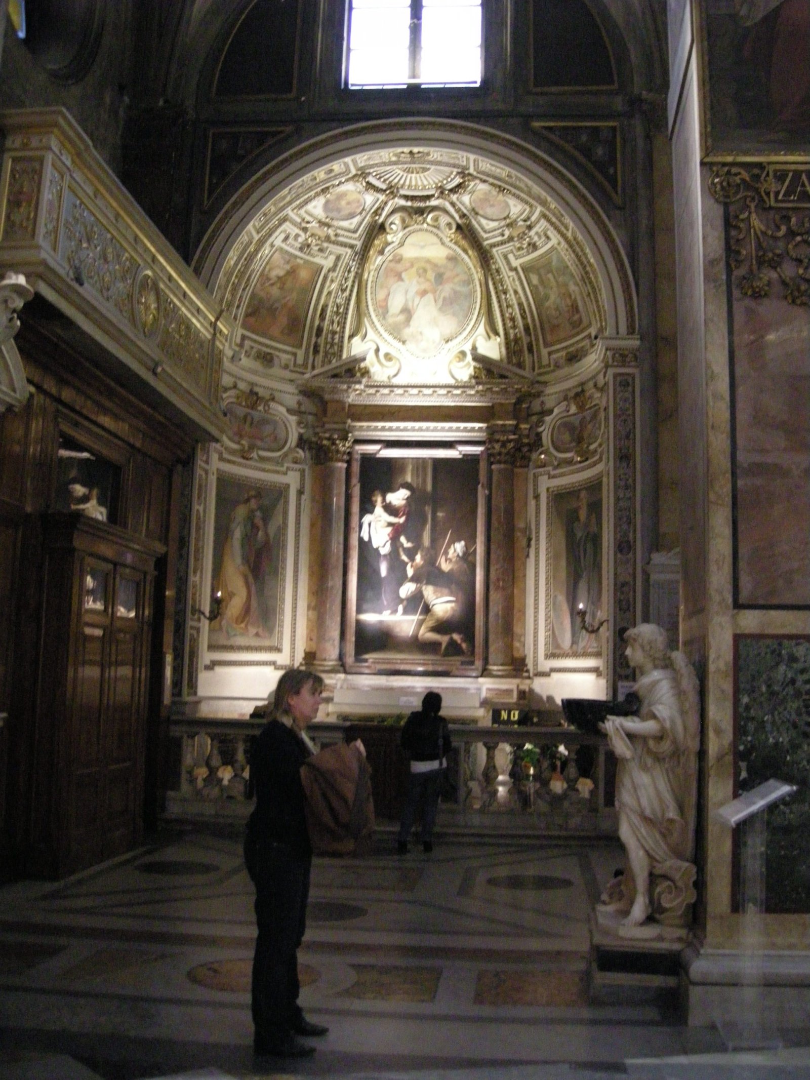 Caravaggio Madonna dei Pellegrini (Loreto Madonna) - Roma | Secret World Trip Planner
