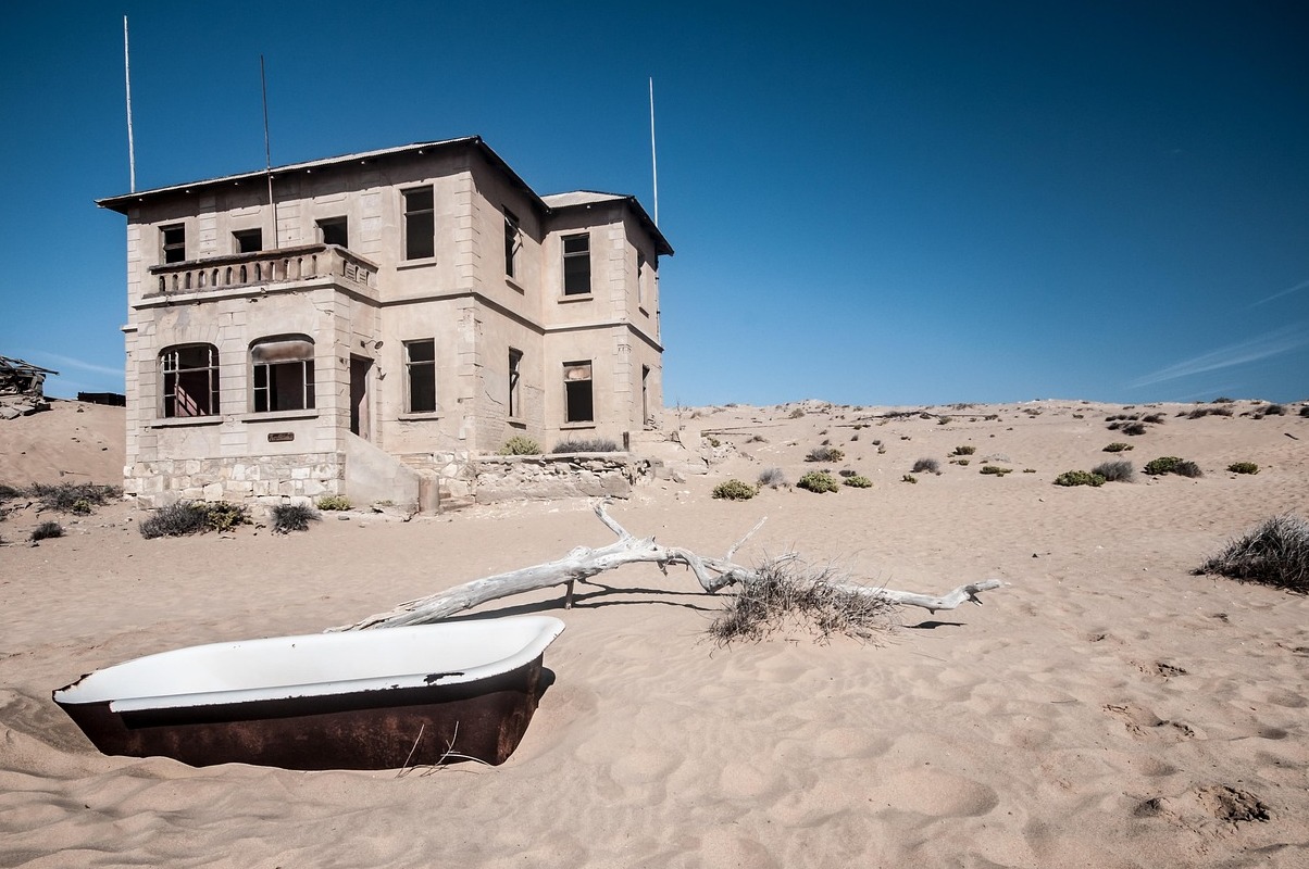The old Ghost town in the Namibia Desert: Kolmanskop - Kolmanskop | Secret World Trip Planner