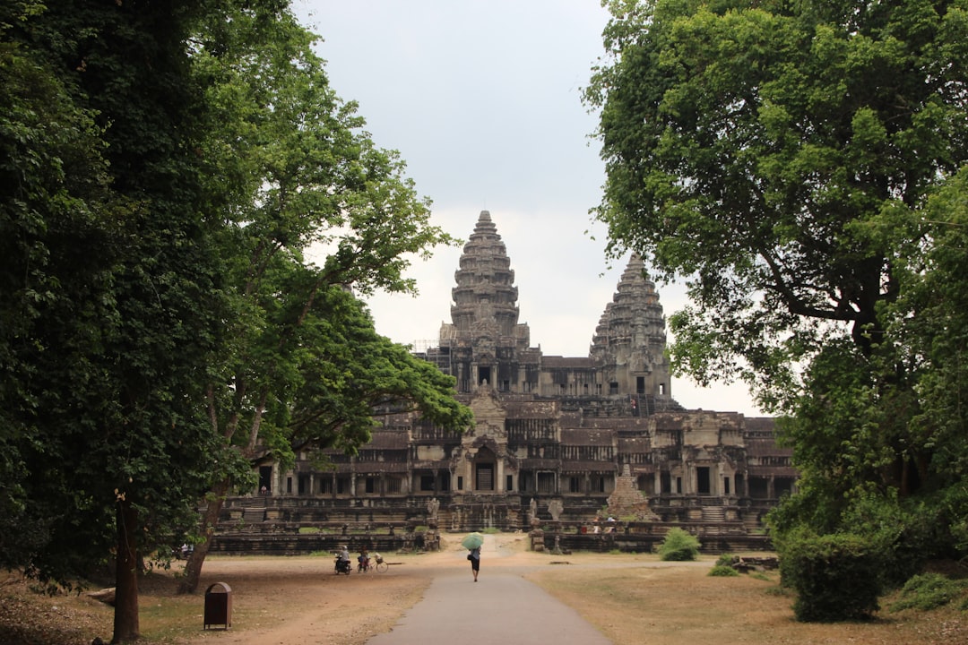 Angkor Wat at Dawn: Towers in Mist and Reflections - Wat Po | Secret World Trip Planner