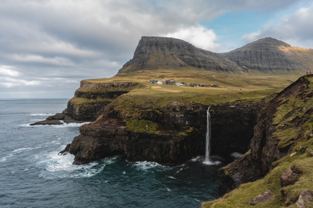 Gásadalur: Sunset Over the Faroe Waterfall - 4H47+CXP | Secret World Trip Planner