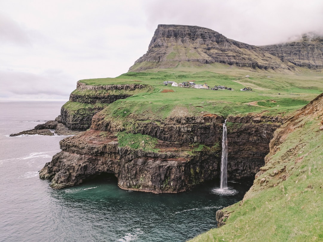 Gásadalur: Sunset Over the Faroe Waterfall - 4H47+CXP | Secret World Trip Planner