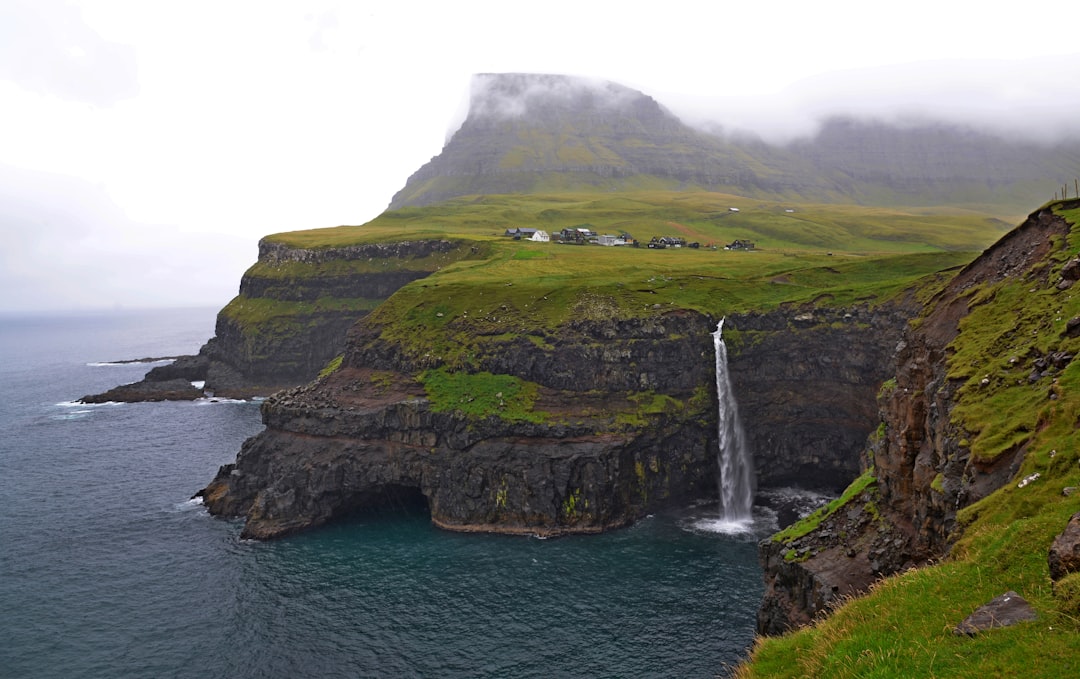 Gásadalur: Sunset Over the Faroe Waterfall - 4H47+CXP | Secret World Trip Planner