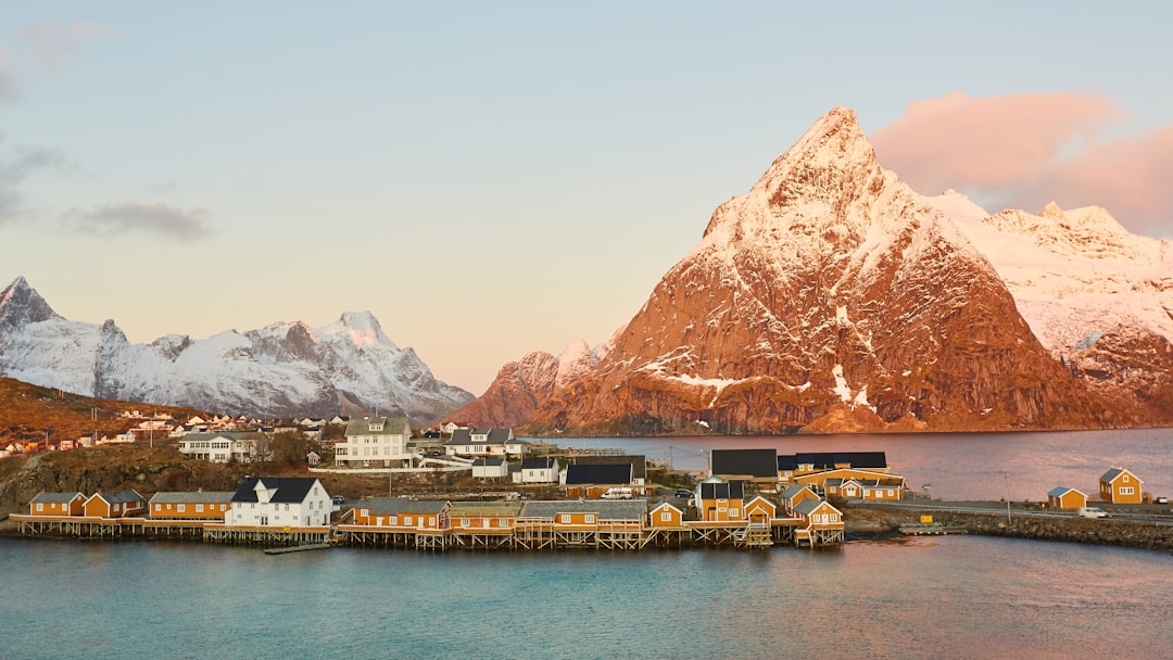 Hamnøy: The Red Cabins Reflecting Lofoten Fjords - Olenilsøya | Secret World Trip Planner
