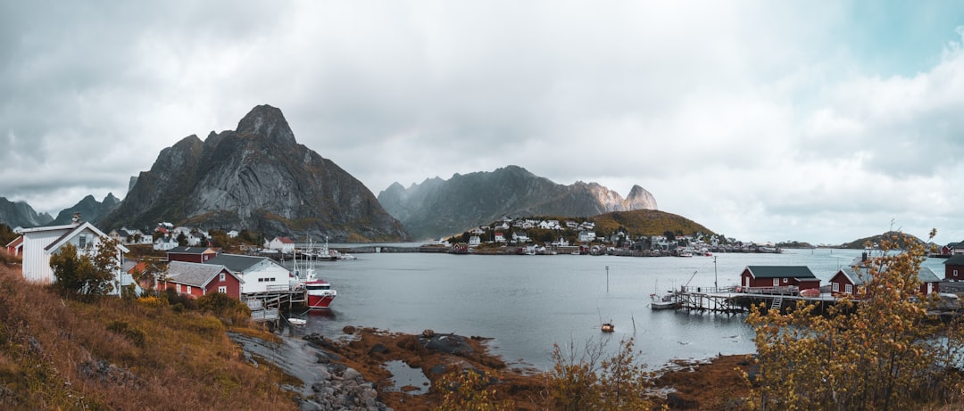Hamnøy: The Red Cabins Reflecting Lofoten Fjords - Olenilsøya | Secret World Trip Planner