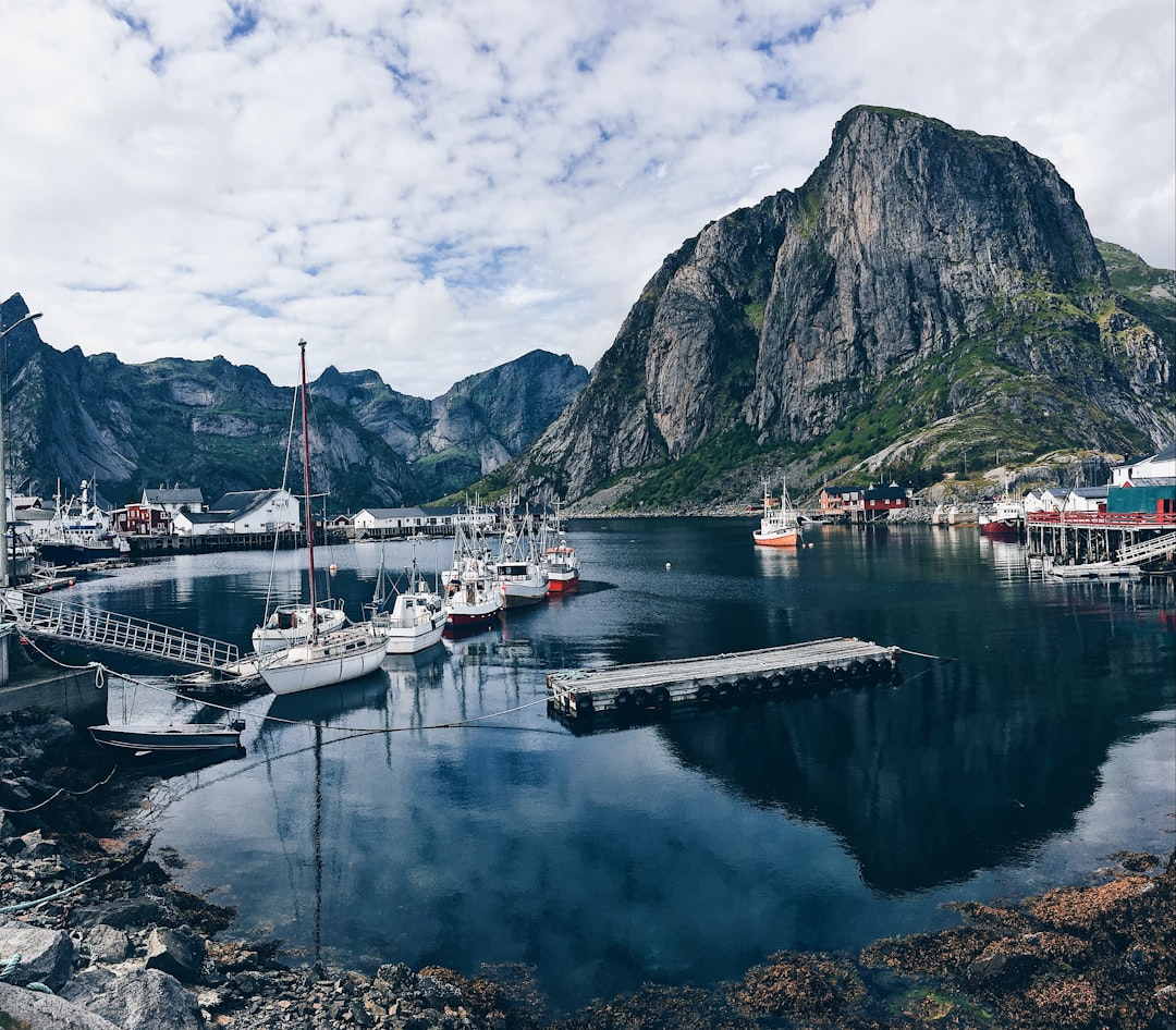 Hamnøy: The Red Cabins Reflecting Lofoten Fjords - Olenilsøya | Secret World Trip Planner