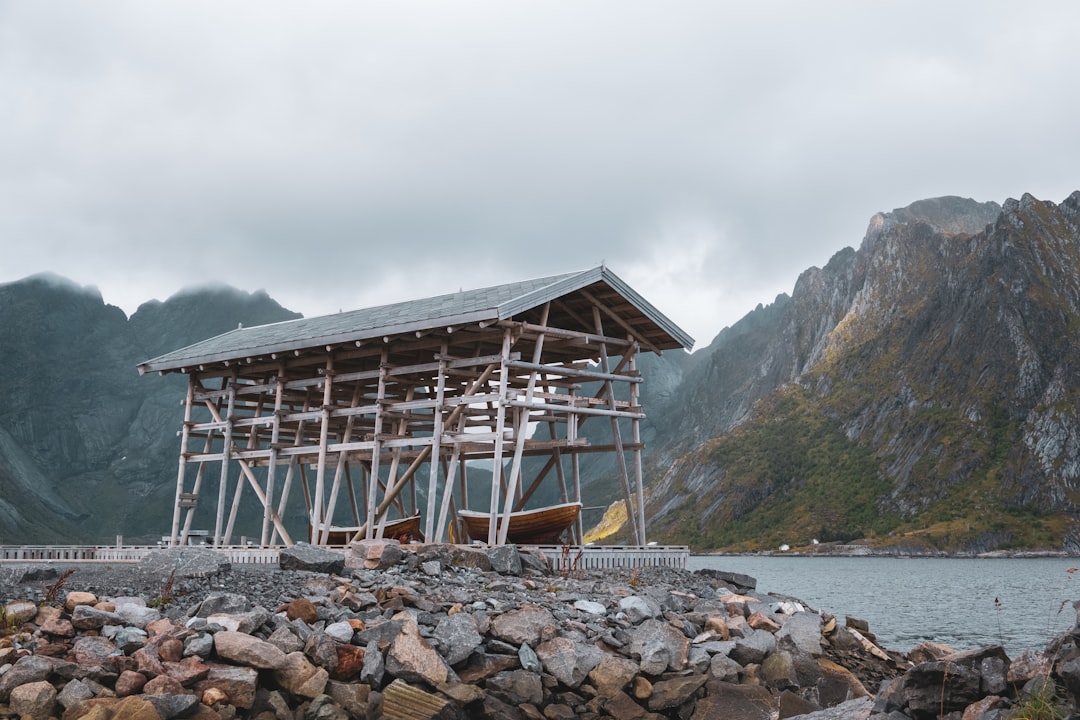 Hamnøy: The Red Cabins Reflecting Lofoten Fjords - Olenilsøya | Secret World Trip Planner